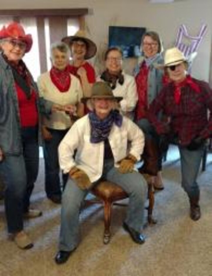 Book Club members dressed in cowboy costumes
