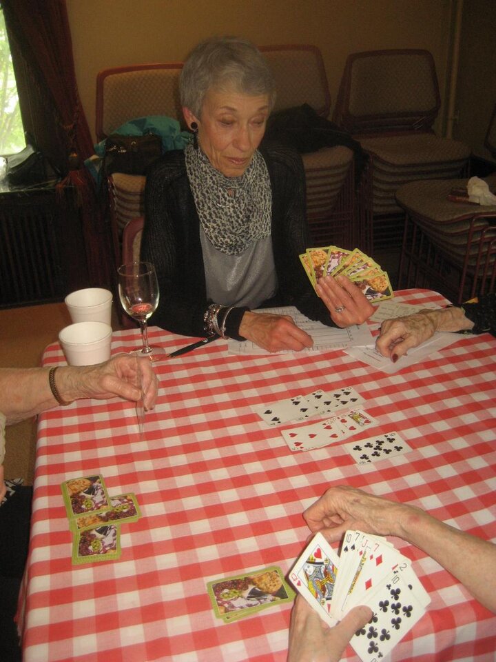 Close up of women playing cards